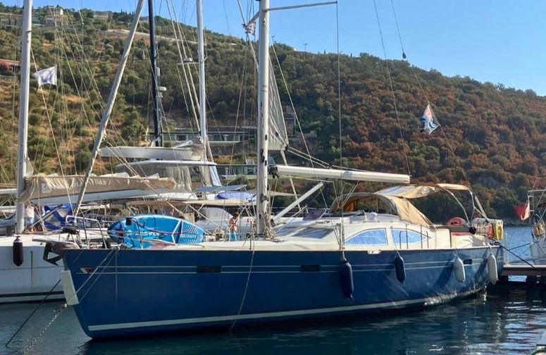Southerly 42 RST docked in a marina. It is a 6 to 8 person sail boat