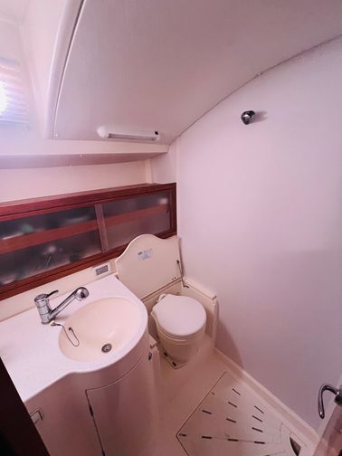 A en-suite bathroom with a toilet and sink